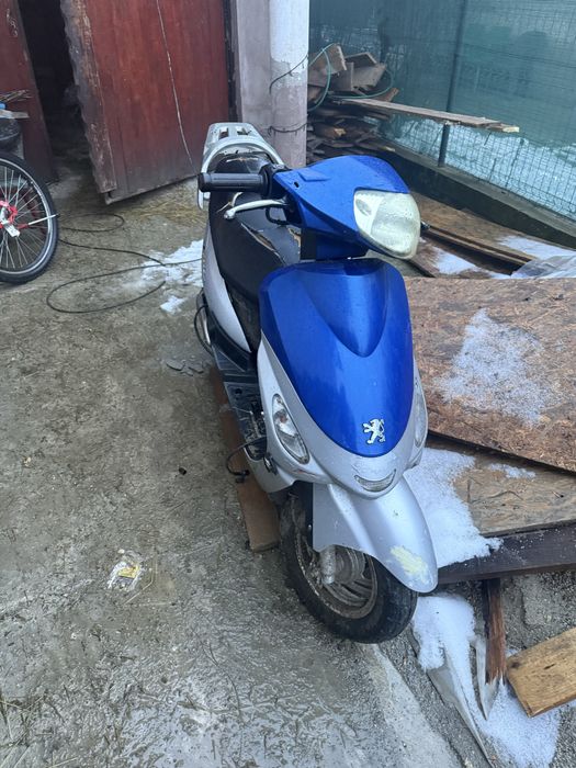 De vânzare  defect sau schimb cu motor de cross 125