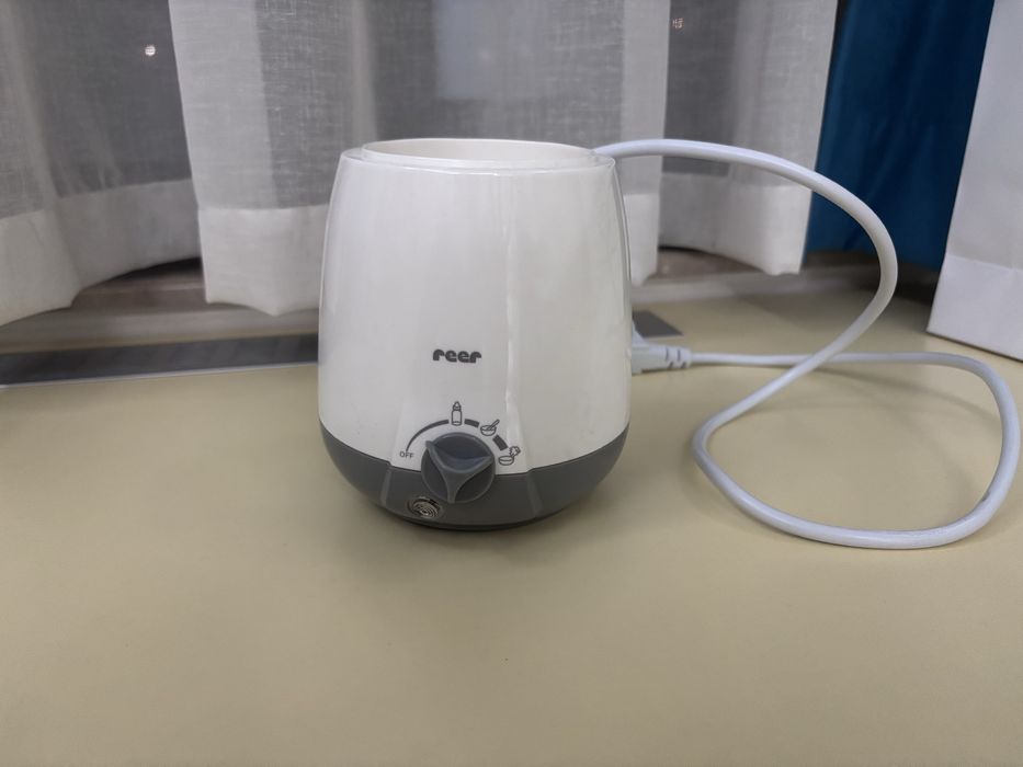 Нагревател за бебешки шишета,бурканчета