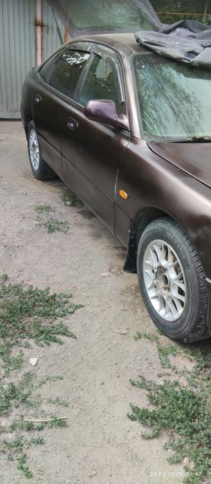 Продам мазду кронос