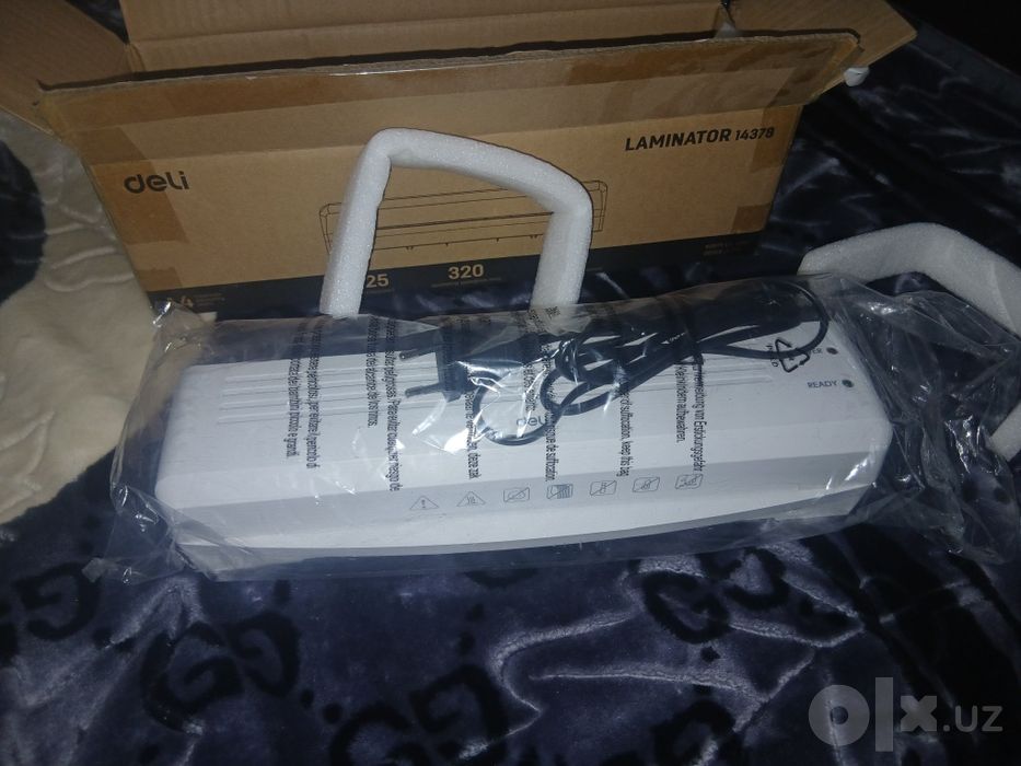 Laminator DELI 14378 aparati rasmli qog‘ozlarnh laminat qilib beradi