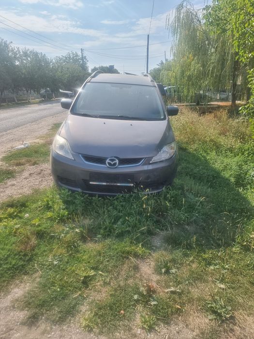 Vând mazda5.  7 locuri
