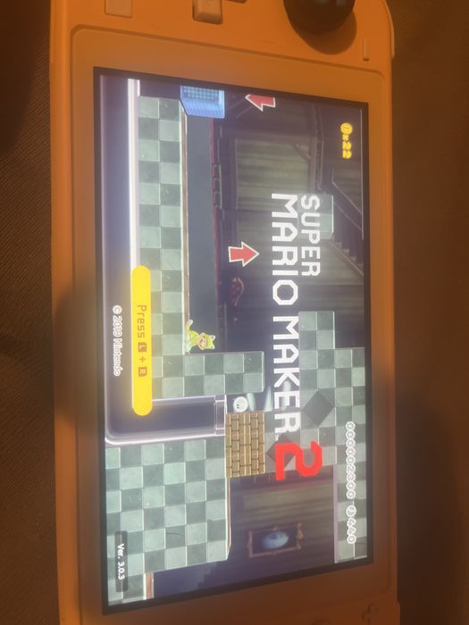 Nintendo Switch Lite Galben + Super Mario Maker 2