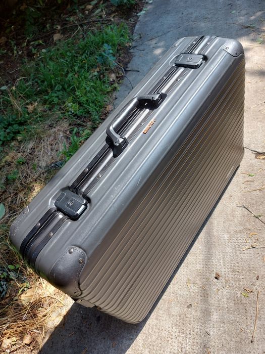 Rimowa valiza troller geamantan