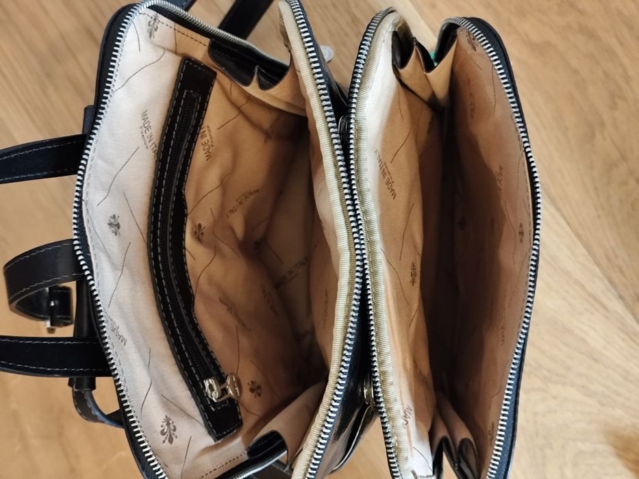 Продавам италианска черна раница от естествена кожа. Нова