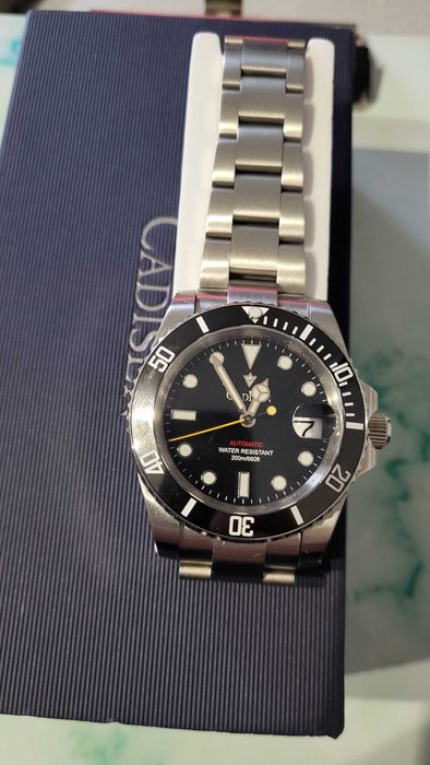 Продавам механичен часовник Cadisen с японски механизъм Seiko NH 35