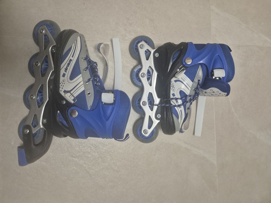 Роликовые коньки