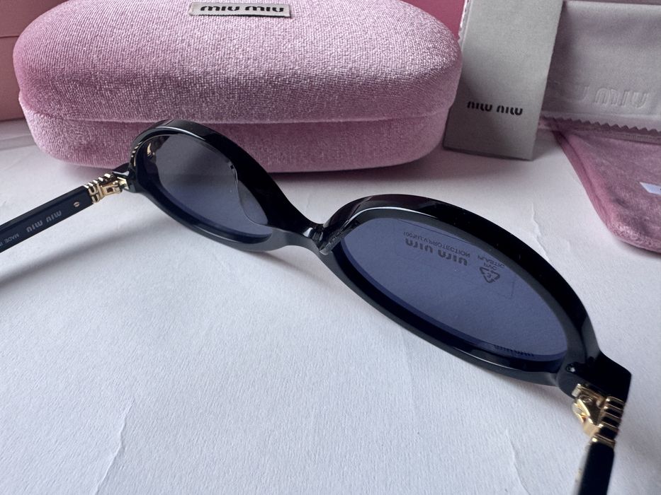 Ochelari de soare Miu Miu Oval SMU04Z 50-18 140, Noi