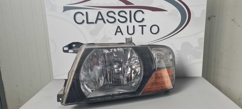 Фар Mitsubishi Pajero 2003г.