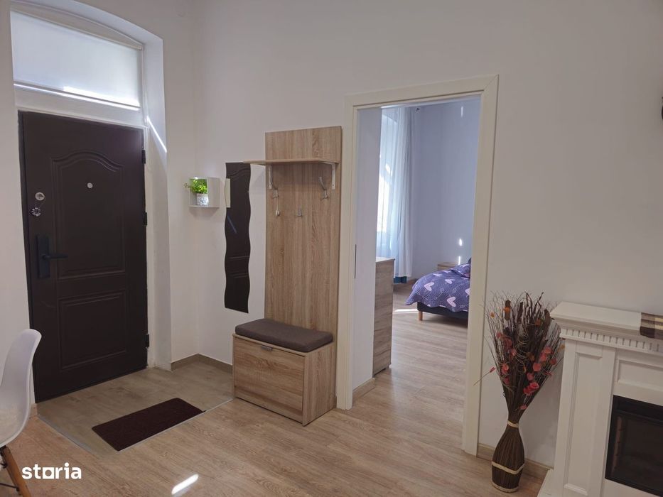 Casa finisata la curte comuna, 56 mp, 2 camere - zona Centrala