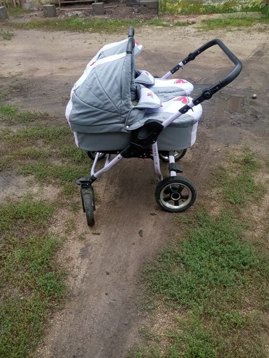Продам коляску для двойняшек