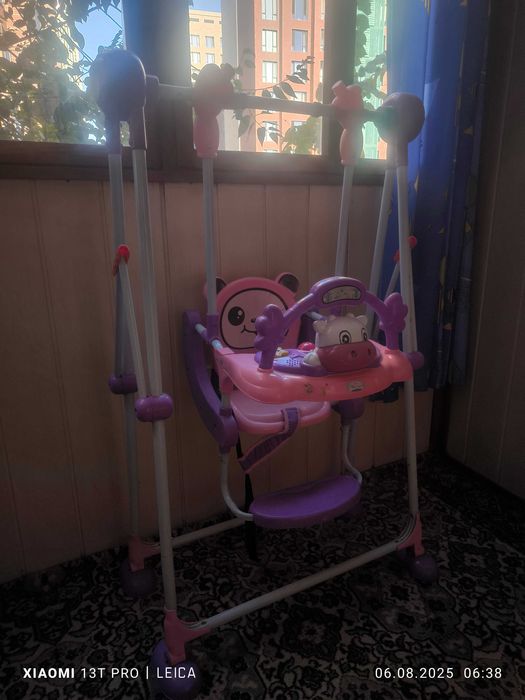 Детская качеля с музыкой