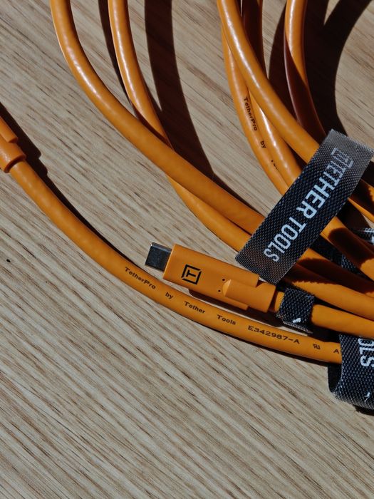 Tether Tools TetherPro USB-C to USB-C cable in high-visibility orange.