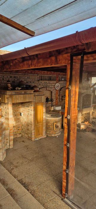 Casă spațioasă cu 6 camere, 3 garaje, livadă și grădină – Buduslău