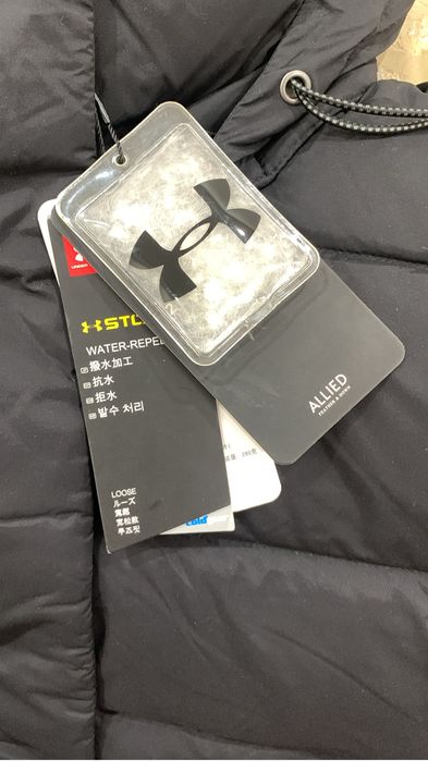 Продам зимний пуховик