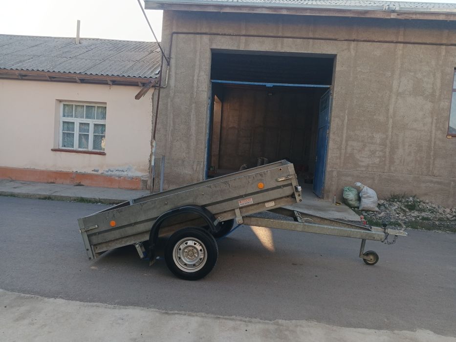 Оцинкованный прицеп с тентом.