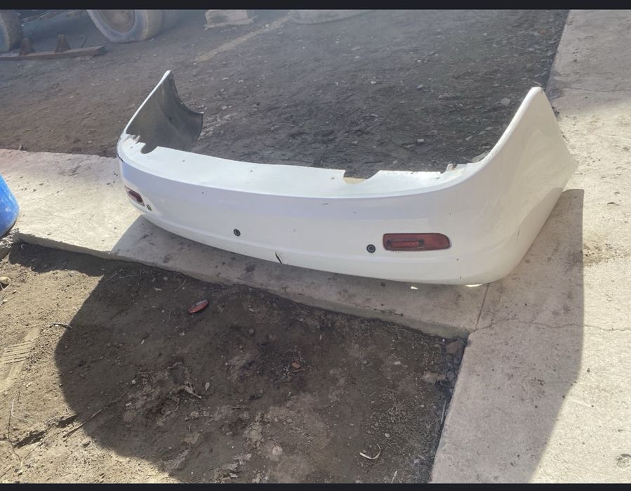 зажний бампер приора 1