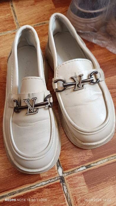 Аяқ киім келісімен