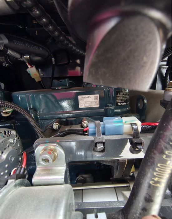 Багер Kubota Shantui