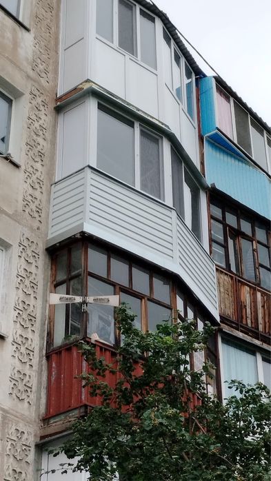 Балконы с обшивкой