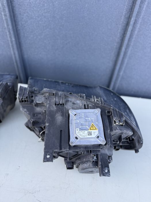 Far Xenon Adaptiv BMW X3 e83 facelift LCI stanga / Dreapta