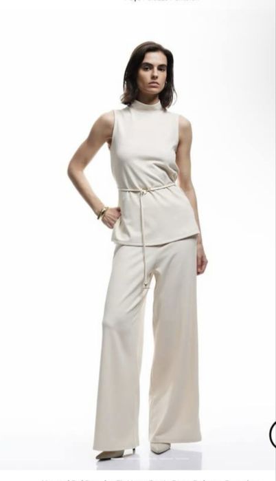 Продам новый костюм