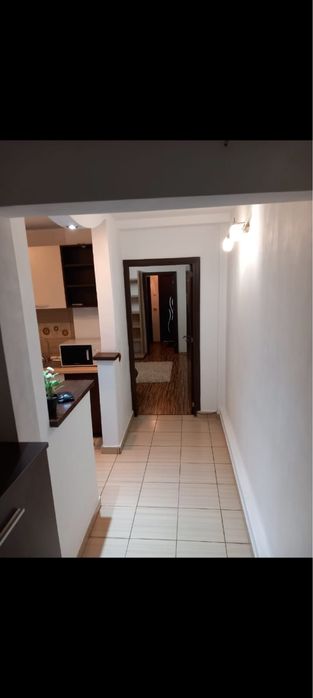 Apartament 2 camere de inchiriat etaj 2 din 4 cu centrala si mobilat