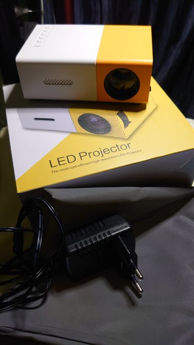 Проектор, дарсонваль, кошелек