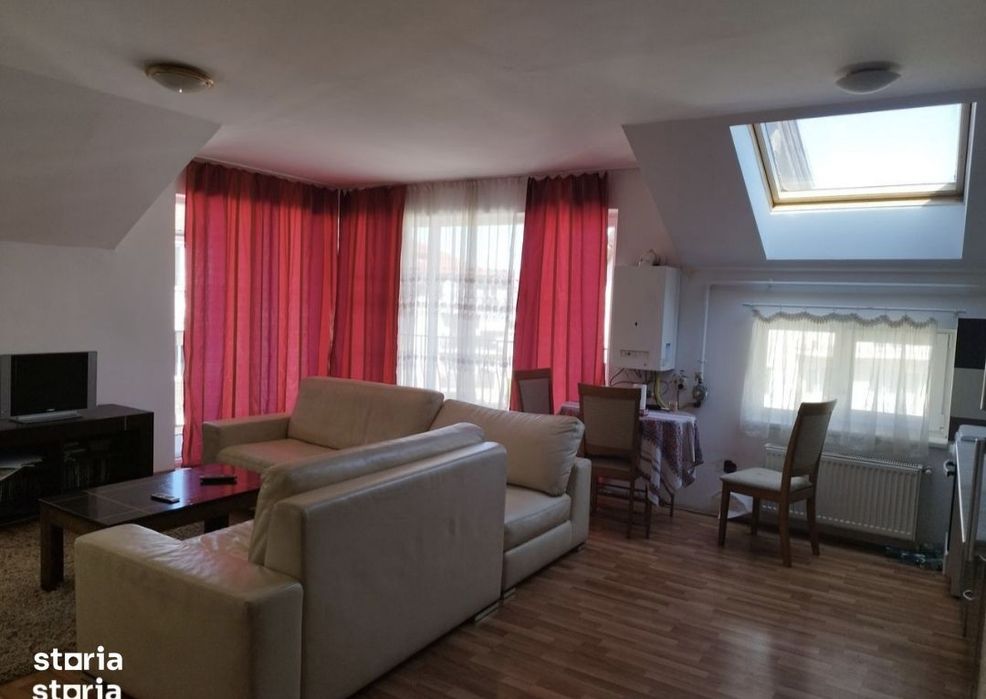 Apartament modern, două balcoane,parcare, living cu bucătărie,dormitor