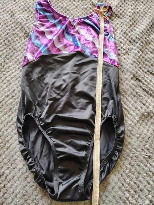 Трика за спортна гимнастика с къс или без ръкав