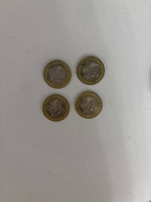 Коллекционные монеты,тенге
