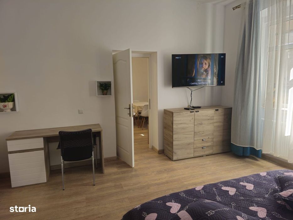 Casa finisata la curte comuna, 56 mp, 2 camere - zona Centrala