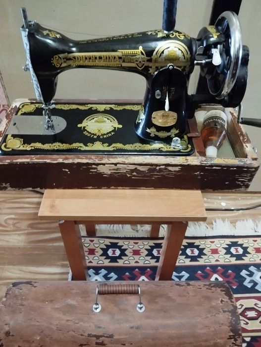 Ручная швейная  машинка.