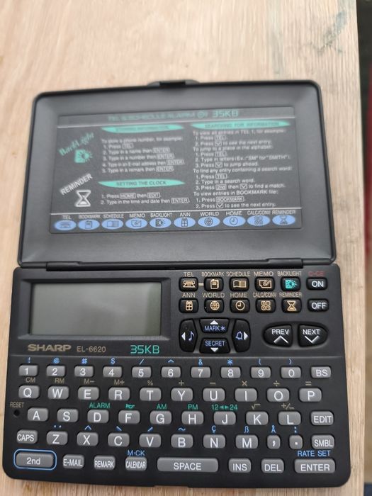 Agenda telefonică,calculator sharp