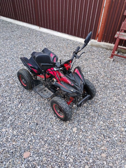 Atv-u 49cc pentru copii 7-12ani