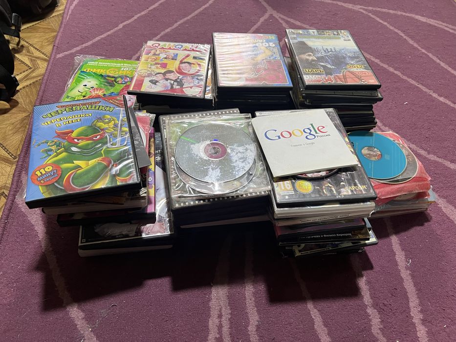 DVD диски, огромная куча