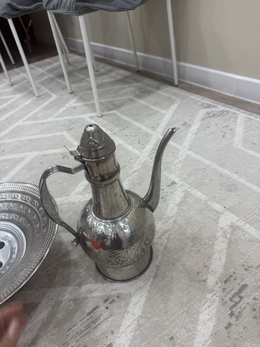 Құман, тазигімен