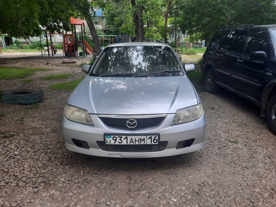 Машина мазда фамилия