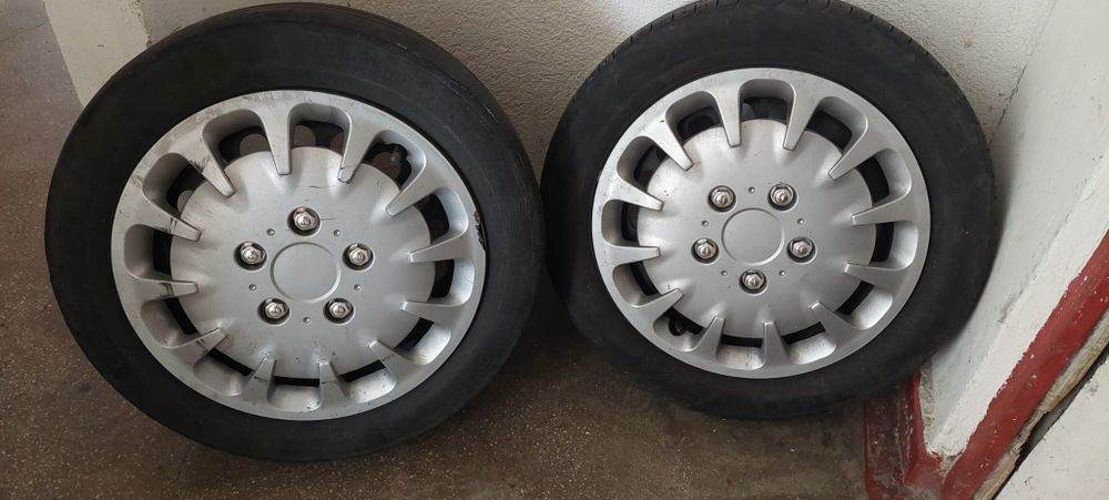 Set 4 jante tabla cu anvelope de vara si capace