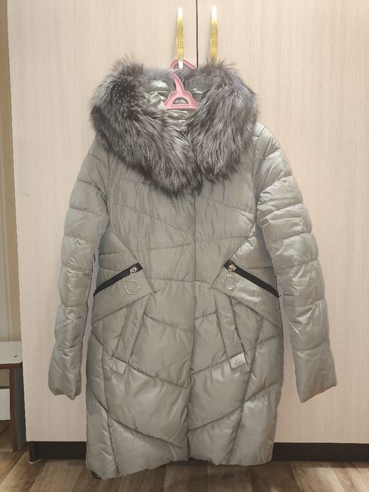 Продам пуховик б/у