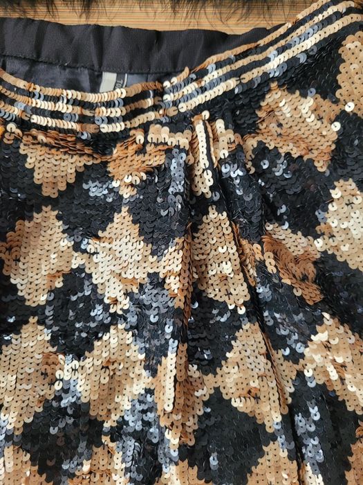 Vesta pene struț, fusta paiete Topshop