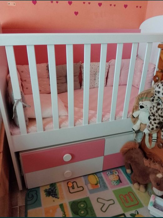 Детско легло с люлеещ механизъм