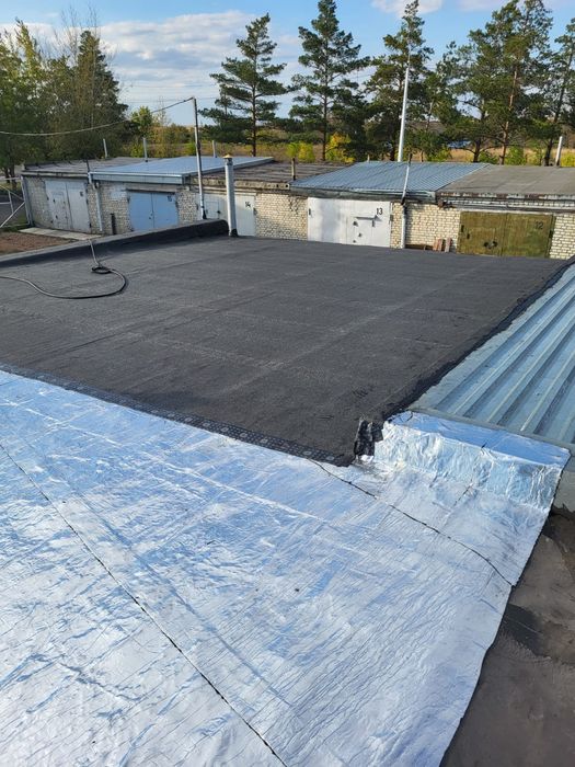 Кровля гаражей бикростом.