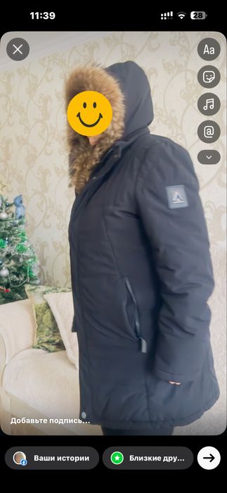 Продам зимний пуховик