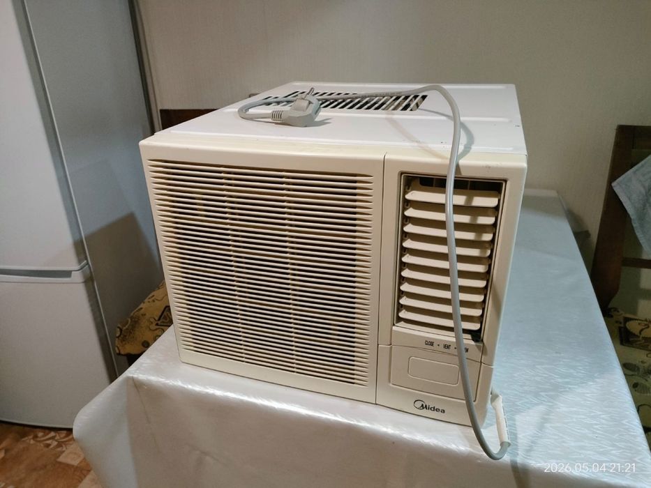 Оконный кондиционер “Midea”