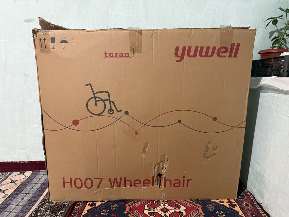Продам новую инвалидную коляску Yuwell H007