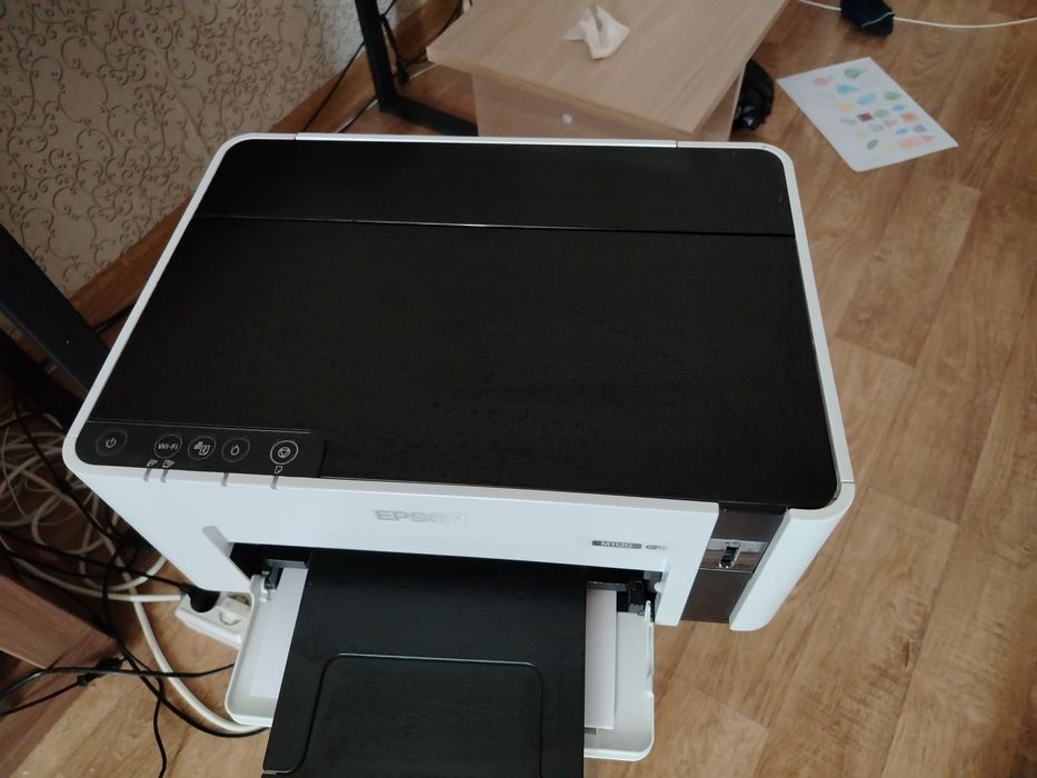 Продам чёрно белый принтер епсон M1120 новый
