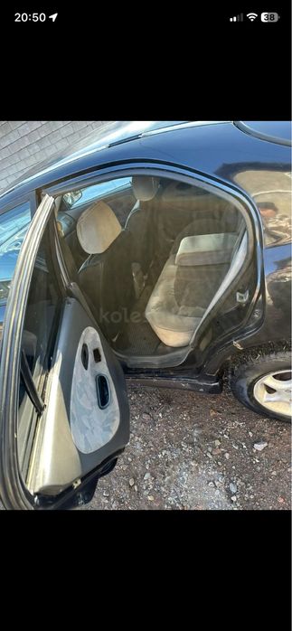 Митсубиши каризма