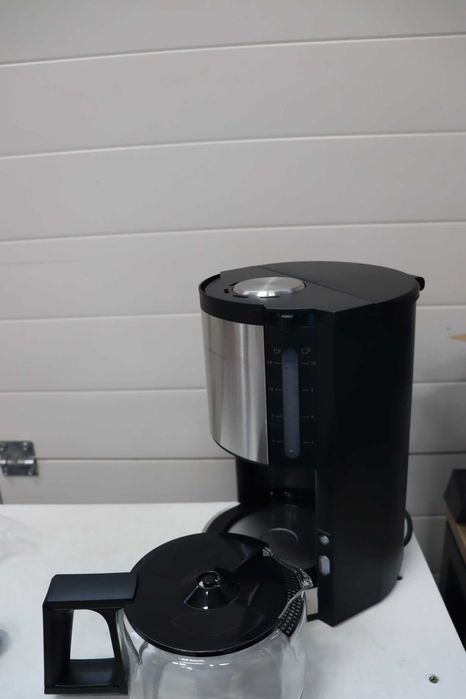 Кафемашина Krups KM321 Proaroma Plus Glass, 10 чаши, 1100 W, модерен дизайн, черна с апликация от неръждаема стомана [Енергиен клас B]