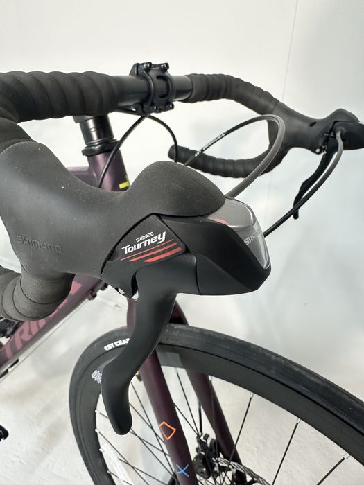 Шоссейный велосипед новый Trinx