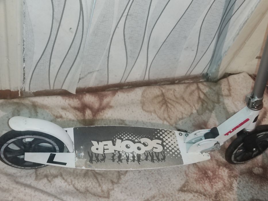 Самокат в отличном состоянии.